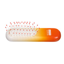 Щетка Dewal Beauty серия "Caramel"мини, массажная,на подушке,с нейлоновым штифтом, из бука,оранжевая с белым.
